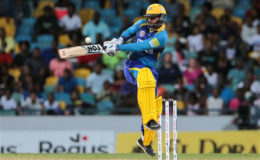Tridents batsman Nicholas Pooran hits a delivery for four during Match 18 of the Hero Caribbean Premier League match between Barbados Tridents and  St Lucia Zouks at Kensington Oval in Bridgetown, Barbados Sunday. Photo by Ashley Allen/Sportsfile
