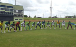 FLASHBACK! National U17 Coach Garvin Nedd doing catching drills with the team during their first day of training at the Guyana National Stadium prior to the regional U17 tournament.(Clifton Ross photo)