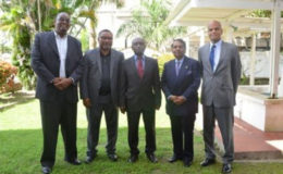 Foreign Affairs Minister Carl Greenidge (centre) flanked by some of the new heads of mission: (from left to right) Dr Kenrick Hunte, High Commissioner-designate  to South Africa; Michael Ten-Pow, Permanent Representative-designate to the UN; Dr Shamir Ally, the designated Head of Mission to Kuwait and Dr David Pollard, High Commissioner-designate  to India. (GINA photo)
