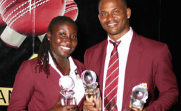 Marlon Samuels (right) and Stafanie Taylor pose with their trophies after sweeping the top awards at the WICB/WIPA Awards Ceremony on Tuesday night. (Photo courtesy WICB)