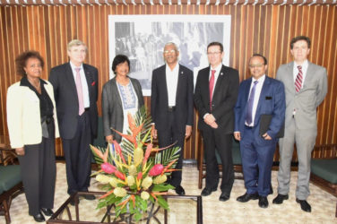 UN team meets President on death penalty: President David Granger (centre) is flanked by, from left to right: Khadija Musa, Resident Representative of the United Nations; Baron Marc Bossuyt, President Emeritus of the Constitutional Court  and Member of the United Nations Committee on the Elimination of Racial Discrimination; Navi Pillay, former United Nations High Commissioner for Human Rights and Former Judge of the International Court of Justice; Ivan Simonovic, Assistant Secretary-General, Office of the High Commissioner for Human Rights; Rajiv Narayan, Senior Policy Adviser, Secretariat of the International Commission against the Death Penalty and Derek Lambe, Head of Political Press and Information Section, Delegation of the European Union in Guyana. The meeting took place yesterday at the Ministry of the Presidency. (Ministry of the Presidency photo) 