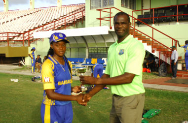 Barbados skipper Shaquana Quintyne receiving her MVP award from match referee Reon King 