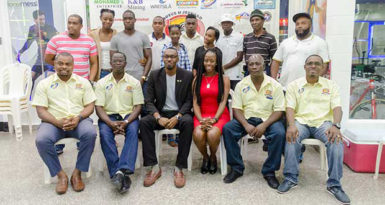 Members of the Boyce/Jefford Committee pose with athletes and Director of Sport, Christopher Jones following the launch of the August 27-28 event on Saturday at the Giftland Mall. 