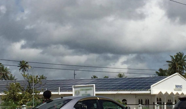 The roof of Nand Persaud International Communications Inc at Tain covered with solar panels