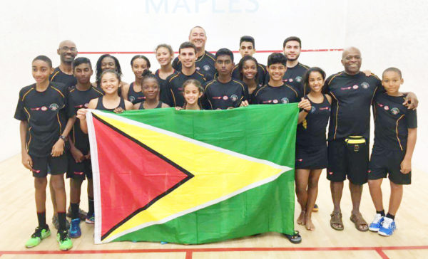 The Guyana Junior Squash team celebrates their overall win at the just concluded Caribbean Junior Squash Championships.