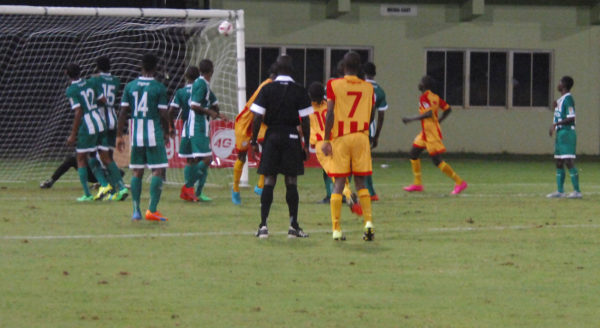 LEAVE IT TO JOBE! Jobe Caesar (no.10) of Chase Academy scores what proved to be the deciding goal against four-time winners and defending champs Wismar/Christianburg Secondary in the grand finale of the Digicel Schools Football Championship at the National Stadium in Providence last night. (Orlando Charles photo)