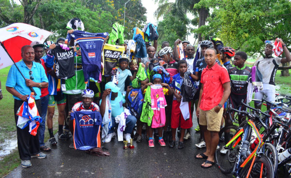 Former National Cyclist, Enzo Matthews makes the donation on behalf of US based Scott Savory recently in the National Park. 