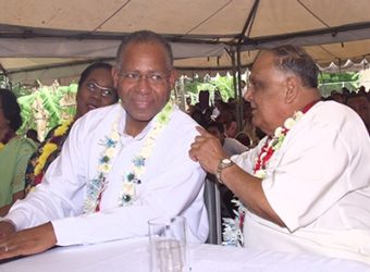 In this 2004 photograph, then prime minister Patrick Manning, has a tête-à-tête with Sanathan Dharma Maha Sabha secretary general Sat Maharaj during an Indian Arrival Day celebration in Debe.