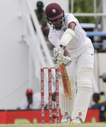 Opener Kraigg Brathwaite defends a delivery during his top score of 74 on the third day of the opening Test against India yesterday. (Photo courtesy WICB)