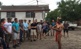St. Cuthbert’s Toshao, Lennox Shuman, demonstrates the proper use of an indigenous bow and arrow (US Embassy photo)