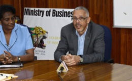 Minister of Business and Tourism, Dominic Gaskin and his Permanent Secretary, Rajdai Jagernauth (GINA photo)

