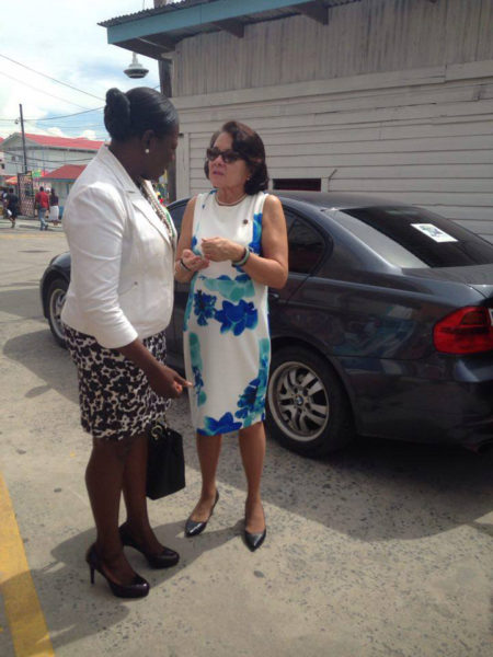 First Lady Sandra Granger (at right) and Minister within the Ministry of Education Nicolette Henry engaged in conversation yesterday at the GPH after visiting the victims of the accident.