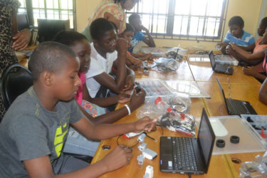 Students from the Buxton-Friendship, East Coast Demerara area participating in the STEM Guyana Robotic Camp at the Friendship Primary School. (Ministry of the Presidency photo)