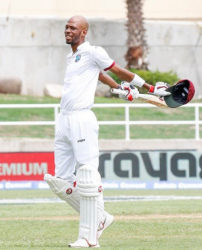Roston Chase celebrates his maiden Test hundred on the final day of the second Test against India. (Photo courtesy WICB Media)