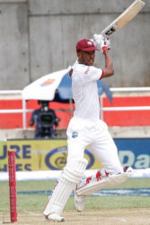 Batsman Roston Chase gathers runs through the off-side during his unbeaten maiden century against India on Wednesday. (Photo courtesy WICB Media)