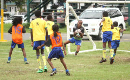 Action between Tucville and Grove Hi-Tech-A at the Parade Ground in the Banks DIH Limited- sponsored Alex Bunbury Sports and Academics Academy u-13 Championship