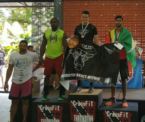 Dillon Mahadeo (right) on the podium following the inaugural CrossFit 12-12-12 Throw Down which took place at the St. Anthony's grounds in West Moorings, Trinidad on Saturday.