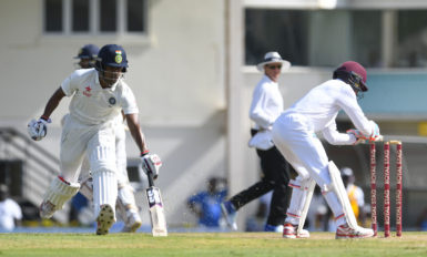 Wriddhiman Saha makes his ground during the first day of the third Seagram's Royal Stag Test Match between West Indies and India at Daren Sammy Cricket Ground, St Lucia yesterday. Photo by WICB Media/Randy Brooks of Brooks Latouche Photography