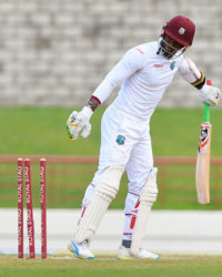 Batsman Marlon Samuels looks back in dismay to see his stumps rattled after being bowled by Bhuvneshwar Kumar. (Photo courtesy WICB Media)