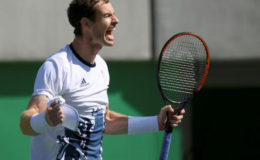 Andy Murray of Britain celebrates after winning his match against Kei Nishikori of Japan. (REUTERS/Toby Melville) 
