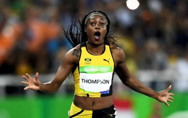 Elaine Thompson of Jamaica celebrates. (REUTERS/Dylan Martinez)