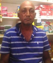 Kemraj Persaud in his shop 