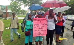  Workers, Sharon Smith, Vanessa Kingston and Paulette Jordon during the protest