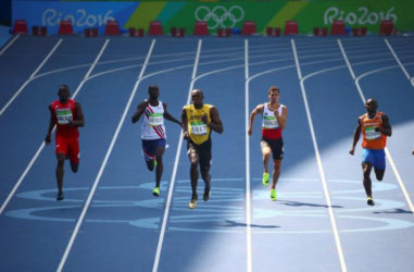 CRUISE CONTROL! Jamaica’s Usain Bolt cruises into the 200m semi-finals yesterday. 