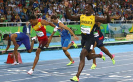 Jamaica’s Omar McLeod, right on his way to becoming the first athlete from his country to win a gold medal in the hurdles event at the Olympic Games.
