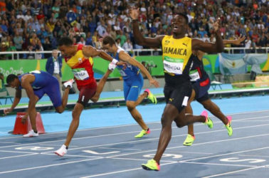 Jamaica’s Omar McLeod, right on his way to becoming the first athlete from his country to win a gold medal in the hurdles event at the Olympic Games. 