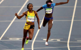 DOUBLING UP!Jamaica’s Elaine Thompson is delighted to add the 200m gold medal to her 100m win.
