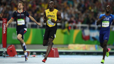 Usain Bolt of Jamaica wins gold. (REUTERS/Dylan Martinez)  