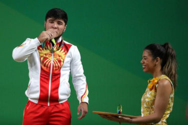 Izzat Artykov (KGZ) in the medal ceremony for the men’s 69kg Group A weightlifting at Riocentro - Pavilion 2 during the Rio 2016 Summer Olympic Games. (Daniel Powers-USA TODAY Sports)