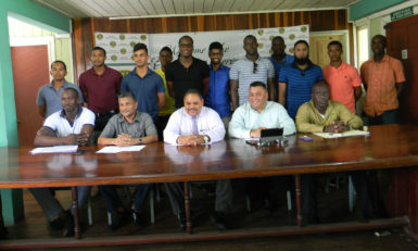 Executives of the GCB (front row, seated) flanked by some of the Guyana Jaguars senior franchise players following the Jaguars 3-Day franchise launch.