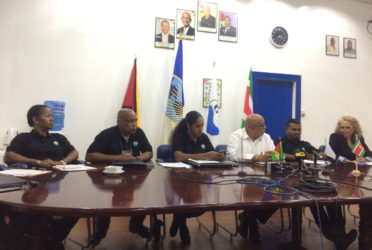 Gerald Feria (second, left) PRO Leanna Bradshaw (third, left) GWI CEO Richard Van West-Charles (third, right) and IDB representative Sophie Makonnen (right) with others at yesterday’s press briefing 