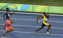 Usain Bolt on  his way to winning the 4x100m relay final for Jamaica and with it his third gold medal of the 2016 Rio Olympic Games in Brazil. (Reuters photo)