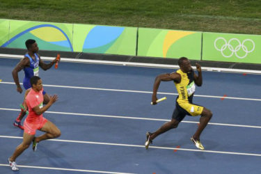 Usain Bolt on  his way to winning the 4x100m relay final for Jamaica and with it his third gold medal of the 2016 Rio Olympic Games in Brazil. (Reuters photo) 