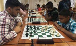 Roberto Neto, 19, (left) is a member of the 2016 Guyana Olympiad chess team. A newcomer to the game, he enjoyed some robust successes by defeating the senior and junior national champions on occasion. Although he only began playing the game in 2010, Neto has been competing regularly in tournaments and has become a prominent fixture in competitions. In this photograph, he faces St Stanislaus’ student Gansham Alijohn in a recent tournament.
