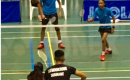 Guyana’s Narayan and Priyanna Ramdhani in action in the mixed doubles semi-final on Friday.