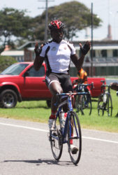 Orville Hinds reacts after crossing the finish line for his seventh victory of the season. (Orlando Charles photo)