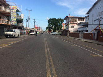 The stretch of Regent Street between Alexander and Cummings Streets which was to accommodate vendors for the pilot flea market at 2.15pm yesterday (Photo by David Papannah) 