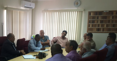 Minister of Natural Resources, Raphael Trotman (left) and the private sector team. (Ministry of Natural Resources photo)