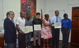 Minister within the Ministry of Education, Nicolette Henry, along with president of the GOA, K Juman-Yassin and some of Guyana’s representatives at Rio 2016 pose for a photo opportunity following yesterday’s presentations of Commendation Certificates.
