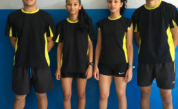 SECOND BEST! From left Jonathan Mangra, Priyanna Ramdhani, Ambika Ramraj and Narayan Ramdhani after they won a silver medal in the team event at the CAREBACO junior badminton championships in Aruba.