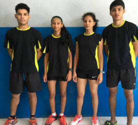 SECOND BEST! From left Jonathan Mangra, Priyanna Ramdhani, Ambika Ramraj and Narayan Ramdhani after they won a silver medal in the team event at the CAREBACO junior badminton championships in Aruba.