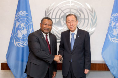 Ambassador Michael Ten-Pow (left) being congratulated by UN Secretary-General Ban Ki-moon (Ministry of Foreign Affairs photo)