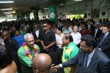 President David Granger, who is leader of the PNCR, greets AFC leader and Minister of Public Security Khemraj Ramjattan ahead of the opening of the PNCR’s 19th Biennial Delegates’ Congress at Congress Place, Sophia yesterday. (Photo by Keno George)
