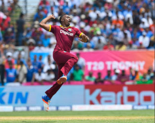 All-rounder Dwayne Bravo exults after claiming a wicket during India’s innings in the opening Twenty20 International yesterday. (Photo courtesy WICB Media)  