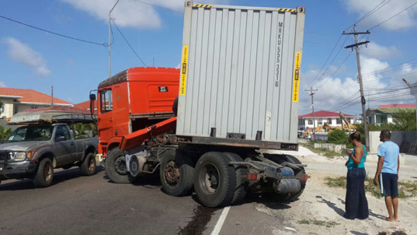 Around 3 pm yesterday, this container truck, which was heading towards the city, suffered a brake malfunction on the East Coast Demerara Public Road at Le Ressouvenir. Its driver Shane Singh was able to manouvre it to a halt. Aside from a leaking fuel tank, under which a bucket was placed, and slight damage to the body of the vehicle, the only other visible impact was the long line of backed up traffic along the roadway. Luckily, neither the driver nor his accompanying porter was injured and road users in the vicinity of the truck at the time of the incident escaped harm as well.