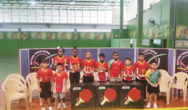 The Guyana Table Tennis team pose with their trophies following yesterday’s award ceremony at the CASH.